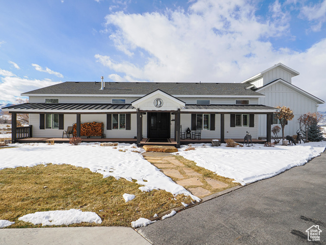 Welcome to the ultimate retreat in this stunning Heber City Estate! Breathtaking back view of Mt Timpanogos. Chefs kitchen with Wolf gas range/oven, enormous decorative Wolf hood, built in refrigerator. Large island for prepping for gatherings, new Taj Mahal Quartzite countertops, new wood plank engineered flooring on main, new plush carpet on main. Enjoy the warmth from the  fireplace in great room on cold winter mornings. Owners en-suite boast new Taj Mahal Quartzite countertops, a luxurious soaking tub and beautifully appointed steam shower.  All bedrooms offer walk in closets, lots of light and fun features. Large open space in basement for family fun and games. wood shop in basement prewired for theater, large walkout basement with beautiful exterior entertaining space. Lovely yard with fire pit patio, greenhouse with garden boxes and plenty more space for the possible equine lover or outdoor toy enthusiast with plenty of  storage in the 30x40 detached garage.. 1/4 Water share included. 3/4 water share available to purchase. Home is pre wired for whole home generator power.