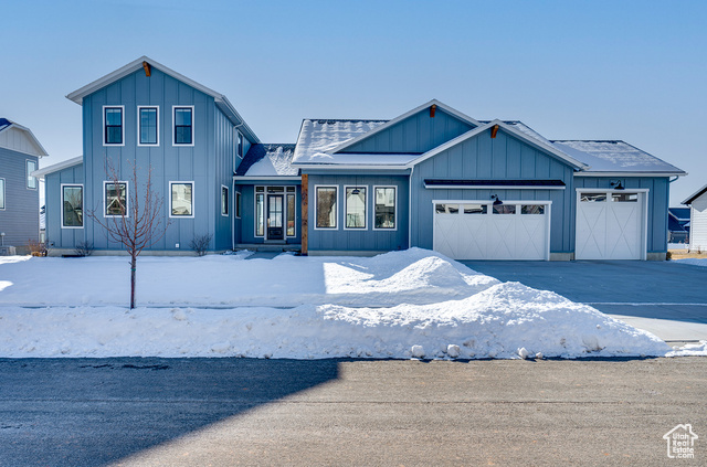 View of front of house with a garage