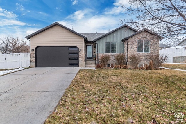 Welcome to this stunning 4-bedroom, 3-bathroom home, boasting 2,574 sq ft of beautifully updated living space on a spacious 0.25-acre lot in a quiet Payson neighborhood. Practically rebuilt down to the studs in 2020, this home offers the modern conveniences and finishes of new construction while maintaining its small-town charm.  The open floor plan features a spacious living area and a modern kitchen with ample cabinetry, making it perfect for family gatherings or entertaining guests. The additional bedrooms provide flexibility for family, guests, or a home office to suit your lifestyle.  A standout feature is the completely separate LEGAL accessory dwelling unit (ADU) in the basement, complete with its own private entrance. Currently rented for $1,100 per month (below market, with potential for an increase), this ADU offers an incredible opportunity for supplemental income. Unlike many homes with similar setups, there is no shared access between the main home and the ADU-each unit has a fully private entrance, offering unmatched privacy.  Additionally, the basement includes a family room that is accessible only from the main part of the house, so the entire basement isn't part of the rental unit, allowing homeowners to enjoy extra living space while benefiting from the ADU.  The fully fenced backyard is ideal for entertaining, gardening, or simply soaking in the stunning mountain views. Conveniently located near schools, parks, shopping, and freeway access, this home combines the charm of Payson with modern amenities and income potential.  Don't miss your chance to own this practically brand-new home-schedule your showing today!