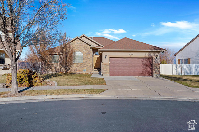 View of front of home featuring a garage