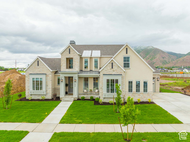 New release of one of our most beautiful floor plans near Maple Mountain HS and Highway 6! With 4 beds and 3.5 bathrooms, there's plenty of room to spread out. A chef's kitchen overlooks the dining room and great room. The primary bathroom has a walk-in shower and oversized walk-in closet. Enjoy a massive pantry! This lot is 1/3 acre with great mountain views. Photos may include options that are not included in this listing; verify with listing agent.