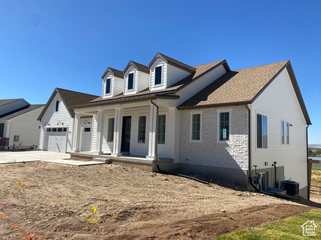 New floor plan built in a farm-style located on a corner lot near the Spanish Fork River Trail. Included in the floor plan are vaulted and boxed ceilings, which add a touch of elegance. The secondary bathroom off the two spare bedrooms upstairs has 2 sinks and a separate toilet/shower room. The primary bedroom has an oversized walk-in closet, a 20 square foot walk-in shower, and separate vanities. Enjoy a chef's kitchen with a wrap-around pantry. A 3-bay garage and unfinished basement are great options for storage. Photos may reflection options that are not included in this listing; contact listing agent for details.