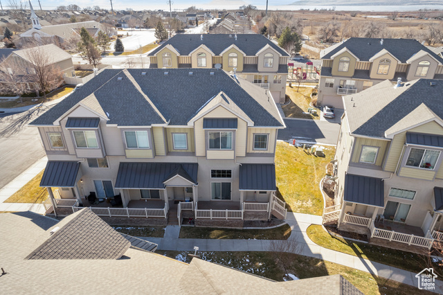 This beautifully updated end-unit townhome is tucked away in a peaceful corner of Lehi, Utah.  Ideally located just minutes from Silicon Slopes, new medical centers, Thanksgiving Point, and top-rated schools, shopping, and entertainment options.  This charming home features fresh paint, new carpet, updated lighting, and fresh finishes throughout.  With 3 spacious bedrooms, 2 bathrooms, and a conveniently located laundry area near the bedrooms, this home offers both comfort and functionality.  The bright and airy kitchen is perfect for cooking and entertaining. Move-in ready and spotless! Square footage figures are provided as a courtesy estimate only and were obtained from county records.  Buyer is advised to obtain an independent measurement.