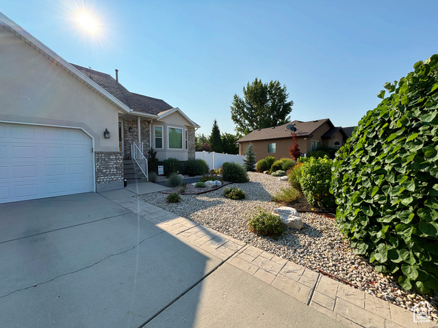 Single story home with a garage