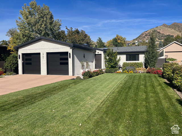 Come see this fabulous remodel and renovated home which offers an indoor and outdoor living experience in the highly-sought after Country Club neighborhood.  This home is minutes to the city, airport, and several Utah ski resorts.  But...you may choose to go to your own backyard to experience the beauty of the mountains. Enjoy your fabulous Endless Pool Swim Spa nestled wonderfully in the terraced backyard surrounded by lush landscaping and a spacious deck. And when done outdoors, you can slip into your BainUltra Hydro-Thermo Massage Tub in your amazing Spa Inspired Master Bath with Heated floors. It has just the right number of amenities that bring both indoor and outdoor comforts to those who live here. This home was taken down to the studs opened up and all electric, plumbing, HVAC, flooring, kitchen, appliances, Landscaping and much more, all redone in 2020. Too much to list... So, see the pictures, see the videos and see you soon! Square footage figures are provided as a courtesy estimate only and were obtained from County/Owner.  Buyer is advised to obtain an independent measurement.