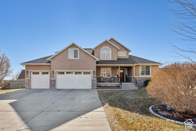 Welcome to this stunning two-story single-family home, where classic charm meets modern sophistication.  This beautifully remodeled residence boasts an exceptional blend of timeless design and contemporary upgrades, showcasing custom work that makes it truly unique. From the moment you step inside, you'll be greeted by an open-concept layout flooded with natural light, enhanced by elegant custom finishes.  The main floor features luxurious hardwood flooring, freshly painted walls in a neutral palette, and custom millwork that adds character and warmth.  The spacious living room flows seamlessly into a chef's dream kitchen with custom cabinetry, sleek quartz countertops, a stylish backsplash, and top-of-the-line stainless steel appliances.  The primary suite on the main floor is a private retreat, offering a spa-inspired ensuite bathroom with a custom double vanity, walk-in shower, and designer fixtures.  Upstairs, the secondary bedrooms are equally impressive, with ample closet space and upgraded finishes. Every detail of this home has been thoughtfully considered, from the custom stair railing to the fully remodeled kitchen and bathrooms, each boasting high-end tiles, modern fixtures, and a cohesive design.  Outside, the backyard is perfect for entertaining or relaxing, with a spacious patio and lush landscaping. With nearly every aspect of this home upgraded and designed with care, this is a rare opportunity to own a move-in-ready gem that blends comfort, style, and functionality.