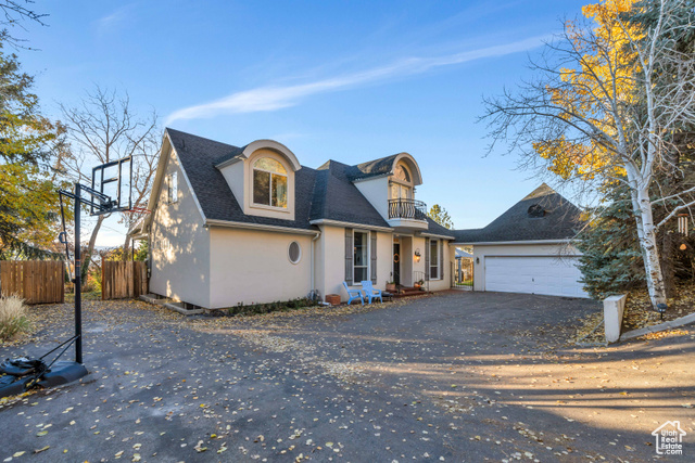 Nestled in the coveted Oak Hills neighborhood, this stunning French chteau offers unparalleled elegance and breathtaking mountain and valley views. Located on a serene, low-traffic street, the home is just steps from the Bonneville Shoreline and Rock Canyon trailheads, making it a dream for outdoor enthusiasts. Inside, soaring ceilings create a grand and airy feel, while the walk-out basement and ample storage provide convenience and functionality. The master suite boasts brand-new carpet and paint, a luxurious jetted tub, and a soft water system for ultimate relaxation. Outdoor living is a highlight of this property. The fully fenced backyard features mature landscaping that ensures privacy, while a spacious pergola, two balconies, and a massive patio make entertaining, dining, or simply unwinding a pleasure. A built-in shed offers additional storage or workspace. Whether you're enjoying the peaceful setting, hosting gatherings, or exploring nearby trails, this home is the perfect blend of style, comfort, and location. Schedule your private showing today and experience the beauty and tranquility of this one-of-a-kind property.