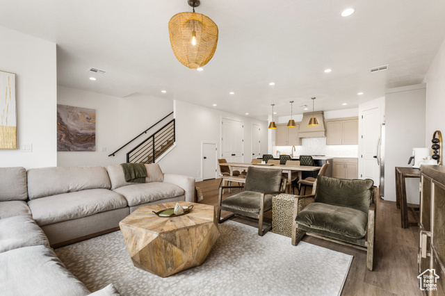 Living room featuring hardwood / wood-style flooring