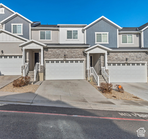 Beautiful 3 Bed 2.5 bathroom Town Home with a walk out basement in a wonderful community! Large 2 car garage with plenty of storage space. Modern color scheme with gorgeous upgrades throughout. Open main level floorplan featuring a center island, quartz countertops and stainless steel appliances. Deck off of the dining area allows for beautiful mountain views along with a fenced in back yard for privacy. Perfect location to the clubhouse and pool.