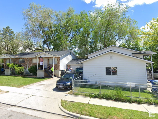 View of front of house with a front yard