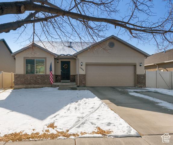 Single story home with a garage