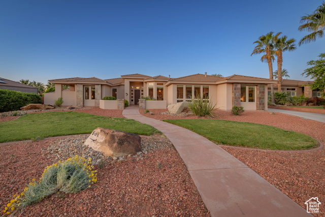 Prairie-style house with a front yard