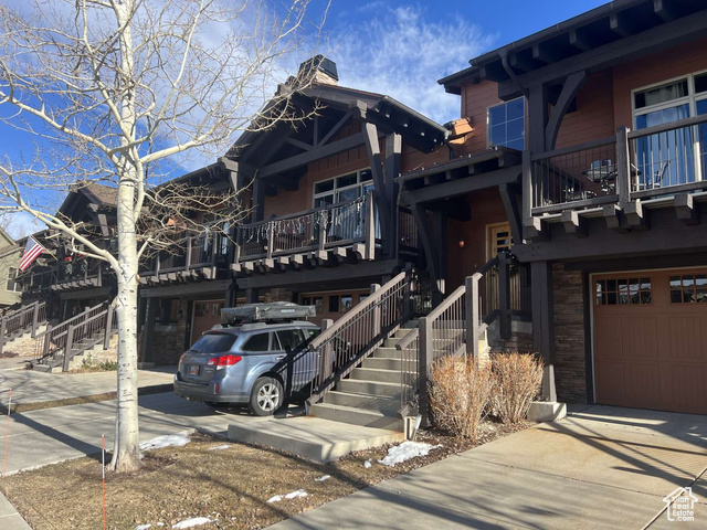 View of front of home featuring a garage