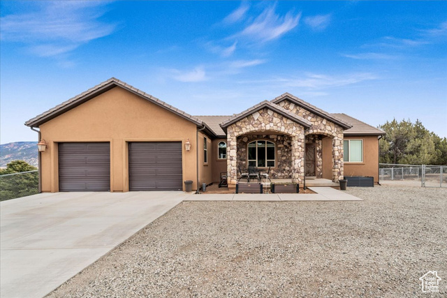 Ranch-style home with a garage