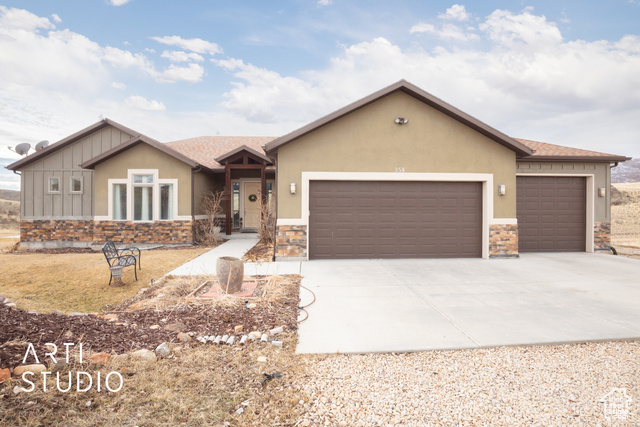 Ranch-style home with a garage