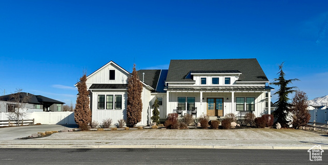 View of front of home featuring covered porch