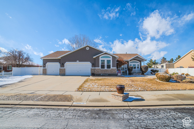 Wow, what an amazing home, so clean and well maintained 3rd car garage is extra deep for 4 cars, huge family room in the basement, with wet bar, great for hosting friends and family, fireplace, Gorgeous landscaping on a 1/2 acre lot, relax in your hot tub, or on the covered patio in the back yard Workbench and sink in garage.    Square footage figures are provided as a courtesy estimate only and were obtained from county records_ .  Buyer is advised to obtain an independent measurement.