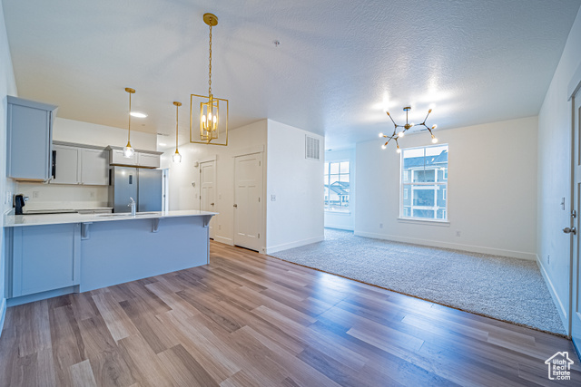 **Open House scheduled for February 22nd: 11:00 am - 1:00 pm!**  Come see the largest floorplan condo in Lehi! This second floor condo boasts custom light fixtures, cabinet handles, freshly cleaned carpets, and so much more. This floorplan defers from most in the area in that it has a popout in the master as a home office or reading nook along with a popout adjacent to the living room for a playroom, den, home office, etc!  Located in Gardner Point, this condo offers countless amenities including but not limited to: community pool, gym, pickleball, basketball courts, walking trails, rentable clubhouse and much more!