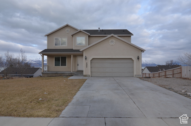 Stunning unobstructed lake and mountain views from all 3 levels of this spacious 2 story home with walk-out basement.  Large open yard for entertainment along with 2 decks to enjoy the views. This quiet neighborhood is away from the noise of the city but close enough to enjoy everything Saratoga Springs has to offer.  Loads of space with a den, 2 family rooms and 5 large bedrooms for the family.