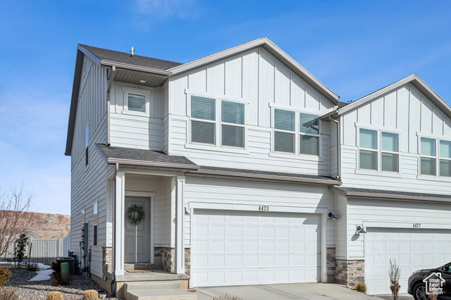 Stunning 3-bedroom end unit townhome in Eagle Mountain for sale. This home offers the perfect blend of modern style and comfortable living. The main level features an open-concept layout LVP flooring and updated lighting, creating a bright and welcoming atmosphere. The kitchen is a chef's dream, showcasing white shaker cabinets, Stainless steel appliances, and a large island with quartz countertops, provides ample space for entertaining. Upstairs, you'll find a spacious owner's suite with a walk-in closet and a luxurious en-suite bathroom featuring a walk-in shower. Two additional bedrooms and a convenient laundry room complete the upper level. The finished basement offers even more living space with a bedroom, a family room, and a full bathroom adorned with stylish black hexagon tile. Upgraded carpet with 8lb memory foam padding ensures comfort throughout the home. Enjoy outdoor living in the fenced-in backyard, perfect for play, BBQs, or relaxing with your pets. Sliding doors off the main level provide seamless access to the backyard. This townhome's end unit location provides added privacy and natural light. With its designer upgrades, spacious layout, and desirable location, this Eagle Mountain gem won't last long! Square Footage from County Records and provided as a courtesy only; buyer to verify all.