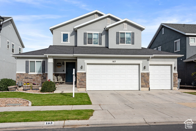 Beautiful 6 bedroom 3.5 bath two-story in the heart of Vineyard with close access to the freeway, Utah Lake, and many beautiful trails throughout the community! The home features numerous upgrades and a 3rd car garage that you will love. This stunning home has the master and laundry on the main floor, a bright and open floor plan, tall open layout with natural lighting throughout the main floor and beautiful stair railings. It has several upgrades a new homeowner could want, including a fully finished basement with lots of storage space, soft water in the bathrooms and laundry, walk in shower, double master elevated rectangle sinks, 2 tone paint, white cabinets, kitchen backsplash, granite countertops throughout the house, stainless steel appliances and large kitchen island. The home also includes a fully landscaped and fenced in the backyard. The neighborhood features two Waters Edge clubhouses, pool, tennis courts, splash pad, gym, and soccer fields. Check out the 3D tour! Buyer is advised to obtain independent measurement. This incredible property won't last long!