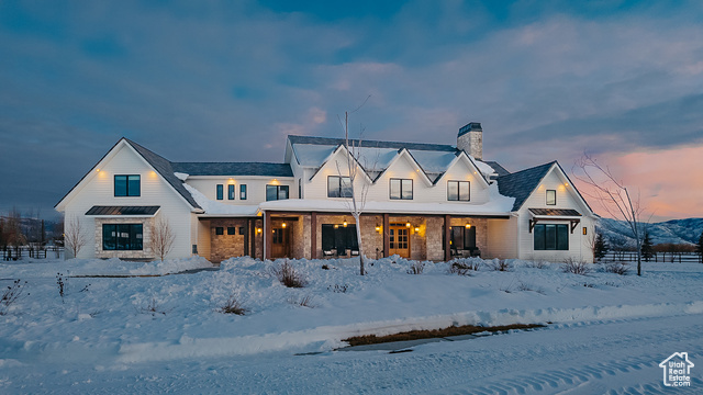 Discover your dream retreat in the Heber/Midway area! This one-of-a-kind estate, built in 2022, features 7 luxurious bedrooms, 7 pristine bathrooms, and a spacious open floor plan filled with natural light and top-of-the-line finishes throughout. Enjoy the soothing flow of Spring Creek as it winds through the property, leading to a spring-fed pond in the northeast corner that's fully stocked with fish. Marvel at breathtaking mountain views, including the iconic Mt. Timpanogas, while outdoor amenities such as two pickleball courts and an exterior basketball hoop invite endless recreation. Additional highlights include small pastures ideal for horses, cows, or other livestock, all maintained effortlessly with a state-of-the-art sprinkler system. Make this exquisite blend of luxury and natural beauty your personal getaway.