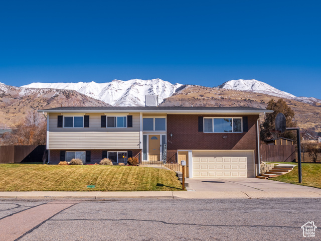 Welcome to your dream home! This stunningly remodeled property features a brand-new kitchen with butcher block countertops, fresh paint, updated texture, and gorgeous newer flooring throughout. Modern upgrades like a tankless water heater and new boiler add to the comfort and efficiency. The home sits on a large premium lot offering breathtaking valley and mountain views and backs onto the popular Murdock Trail-perfect for outdoor enthusiasts. Plus, the extra-deep 2-car garage comes with built-in cabinets and a workshop, making it an ideal space for all your storage and DIY projects. Don't miss out on this beautifully updated gem in a prime location!