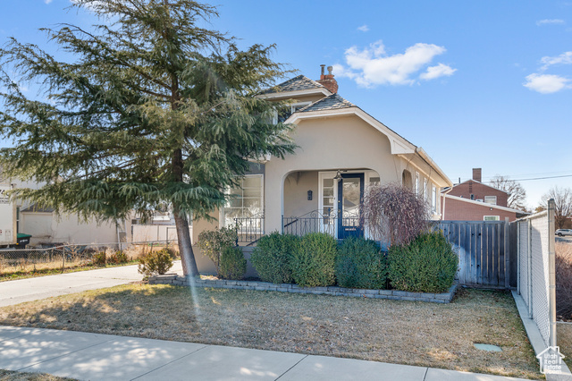 Step into the charm of a bygone era with this beautifully maintained vintage home, perfectly blending classic character with modern conveniences. Located near I-15 and just minutes from historic downtown Provo, this home offers the ideal combination of accessibility and charm. In the summers, enjoy the two block walk to the amazing Provo Farmers Market every Saturday morning for local shopping and entertainment.   Inside, the original hardwood floors have been lovingly preserved-because, let's be honest, they don't make them like this anymore. The roof is newer, the water heater is freshly replaced, and the detached garage is ready to store your car, tools, or an impressive collection of holiday decorations. The fully finished basement with a separate entrance and second kitchen is perfect for that family member who needs a helping hand or offsetting your mortgage with rental income.   The fully fenced backyard is a little slice of low-maintenance paradise. It has just enough grassy space for pets, kids, or casual cartwheels, plus a perfect little spot for a garden-because homegrown tomatoes make everything taste better.  Schedule a showing today and experience this timeless gem for yourself.