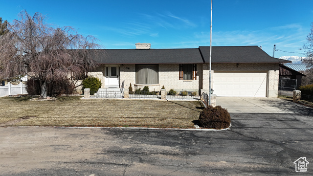 This 3-bedroom, 3-bathroom home offers 3,066 sq. ft. of space, ready for your personal touch! Sitting on a .22-acre lot in a great location, this older home is full of character and just waiting for someone to come in and make it shine. The fully fenced yard provides privacy, while the 26x40 detached shop is perfect for storage, hobbies, or a workshop. If you're looking for a home with solid bones and the opportunity to add your own charm, this is the one! Come see the possibilities today!   Square footage figures are provided as a courtesy estimate only and were obtained from county records. Buyer is advised to obtain an independent measurement.