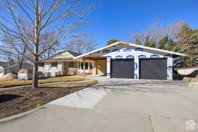 Luxury meets timeless design in this fully remodeled Midcentury Rambler, nestled in the heart of Holladay! White oak floors , 2 car garage, and vaulted ceilings create an airy, open feel, while the sleek, modern kitchen is a true showstopper. The expansive 800+ sq ft primary suite features a state-of-the-art digital shower and French doors leading to a sprawling redwood deck-perfect for morning coffee or evening relaxation. Entertain with ease in the spacious family room, or take advantage of the private walkout basement, complete with a full kitchen and laundry-ideal for guests or multi-generational living. Located in a tranquil neighborhood with breathtaking mountain views, you're just minutes from I-215, world-class skiing, hiking, biking, and vibrant downtown shopping and dining. This is Holladay living at its finest!