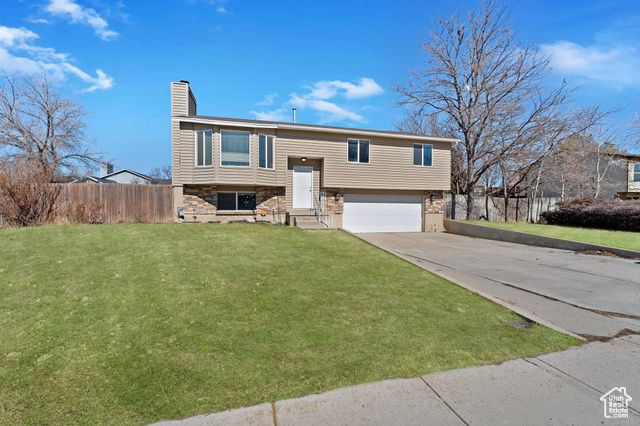 OPEN HOUSE | WEDNESDAY MARCH 5th | 5-7 PM  Instant Equity Opportunity!  Finally- a centrally located, 4 bedroom 2 bathroom home with a big yard and NO HOA for under $500,000. This home is ideally located on an established, sidewalk-lined street in a neighborhood close to Bangerter Highway, I-15, and I-215, allowing easy access to everything Salt Lake Valley has to offer. You'll be approximately 5 minutes from amazing shopping, dining and entertainment at Jordan Landing Shopping Center, 10 minutes from the beloved Gardner Village, 15 minutes from the SLC airport, and 25 minutes from world class outdoor recreation at the Little Cottonwood Canyon. The main living area of this home has a lovely open-concept layout that allows for easy flow of conversation, with beautiful BAY WINDOWS that let in lots of natural light. A major RENOVATION 10 YEARS AGO* brought a new roof and windows, updated kitchen, central air, and refinished exterior. Just recently, brand NEW CARPET was installed throughout.This home sits on an amazing flat, usable QUARTER ACRE LOT where the possibilities to make it yours are endless. Will you add a trampoline and a play set? Set up a basketball court? Add a garden and fire pit and bring in a hot tub? All of the above? If you need RV or boat parking, the extra-wide side yard could accommodate it* One of the coolest features of this home is the OVERSIZED DECK that expands the living space of this home and makes an epic entertaining area.  The OVERSIZED GARAGE has all the storage space you need. Similar homes nearby have recently sold for between $525,000- $540,000. This is priced approximately $45,000 below market value* to quickly attract a buyer due to a change in the sellers circumstances. This home is in good, financeable condition and the seller would LOVE to pass this opportunity on to another owner occupant if possible, but all offers will be equally considered. This is an incredible opportunity to have instant equity in a home with a big yard in an amazing location. Deals like this don't always make it to the MLS, so reach out to your favorite Realtor or the listing agents for a private showing today.    *Per previous MLS listing 1316297  *Subject to city rules, buyer to verify   *Per listing agent's market analysis using the 5 most recent comps within 1/4 mile. Buyer advised to complete their own analysis   *the information provided in this listing is deemed accurate but is provided as a courtesy and not guaranteed. Buyer advised to obtain their own measurements and verify all information contained in this listing