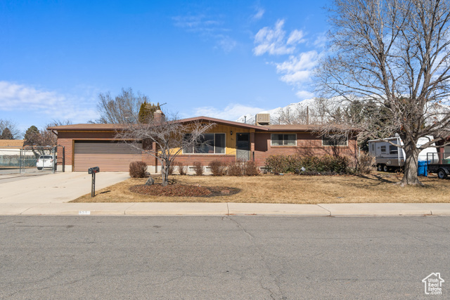 Centrally located, this Orem home is uniquely prepared for an investor or a family eager for the opportunity of easy sweat equity. An unfinished basement, large .39 acre lot, one owner, and original 1970s finishes has poised this home for its next phase of ownership. In under 8 min you can be to either BYU or UVU, in less than 6 min the mouth of Provo Canyon, and in just 3 min University Mall. This is central living at its finest! With Crandall's Fruit Farm and Greenhouse as a backyard neighbor and the North Union Canal, this established area has all the conveniences of the city with your own oasis of peaceful living.