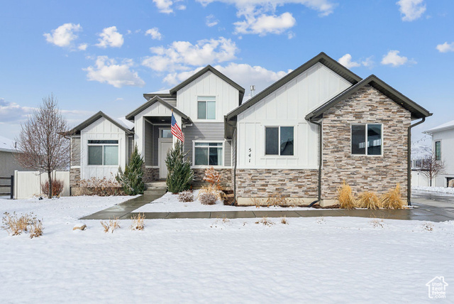 Welcome to this magnificent mountain retreat at 541 E 1400 in Heber City. Built-in 2018, this spacious 3,653 square-foot home features 6 bedrooms and 3.5 bathrooms, offering generous space for all your living needs. Step inside to discover elegant living spaces bathed in natural light. Spectacular views of Mount Timpanogos are visible throughout the property. The thoughtfully designed floor plan includes a fully finished basement with a stylish dry bar, creating an ideal setting for entertaining guests. Outside, the meticulously landscaped and fully fenced backyard provides a private sanctuary. The generous three-car garage offers abundant storage for outdoor equipment, vehicles, and recreational toys. Located in a premier Heber City neighborhood, this home puts you minutes from world-class skiing at Deer Valley Resort. Outdoor enthusiasts will appreciate the convenient access to walking and biking paths, with four state parks within a half-hour drive. Experience the perfect blend of mountain luxury and comfort in this exceptional Heber City home. All information herein is deemed reliable but is not guaranteed. Buyer is responsible to verify all listing information, including square feet/acreage, to buyer's own satisfaction.