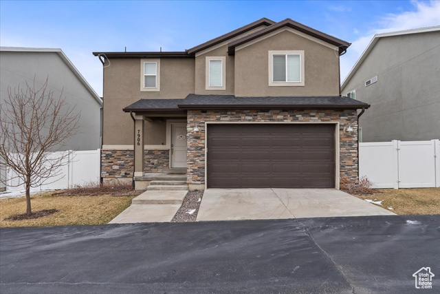 Welcome to this incredible house in West Jordan! This home has a spacious open floor plan on the main level - great for entertaining, cooking, and eating together in the expansive kitchen and dining area, with granite countertops and a contemporary barn door to the pantry. The three bedrooms upstairs are all a great size, one being the large master bedroom that boasts a private bathroom and walk-in closet. The laundry room is conveniently located down the hall from the bedrooms, eliminating the need to transport clothes up and down the stairs! In the basement, there's room to grow with adding another family room or oversized bedroom and bathroom. The backyard is fully fenced, and this private street gives a community feeling in this wonderful location. This house was built in 2019 and has been well taken care of, come tour this house today!  Square footage figures are provided as a courtesy estimate obtained by county records.  Buyer is advised to obtain an independent measurement.