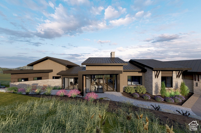 2177 E NOTCH CIR 354 Heber City, Utah Full golf membership with a swim spa on one of the last remaining A+ lots. This semi-custom opportunity allows for perzonalized customizations of your dream home at a fixed cost. Located within the gates of the coveted Red Ledges neighborhood, this new construction home sits at the end of a private cul-de-sac a few short minutes from the main gate. Perched up on the mountain, this home boasts unobstructed views of Mount Timpanogos and the Heber Valley from every room. With open space on two sides of the property, it's privacy is unrivaled. The tree lined driveway is pre-plumbed for radiant heat and leads you to an oversized three car garage equipped with epoxy floors, an electric car charger and a wall mounted gas heater. The primary suite is a sanctuary. Looking out at Junipers trees on one side and Mount Timpanogos on the other, the primary suite features an owner's office, a spacious windowed closet with it's own washer dryer, a spa-grade bathroom with heated floors, a gas fireplace and two outdoor spaces private to the suite. The fully equipped chef's kitchen has top-of-the-line appliances including two dishwashers, a temperature controlled glass wine wall and a massive pantry accessible from the kitchen through a hidden door and from the mud room on the other side. The mud room has a laundry room with a sink, lockers wired for heated boot warmers, a coat closet and bench with shoe storage. With over 1,800 square feet of outdoor space split over four separate spaces, each space offers seamless indoor outdoor living. The outdoor area off of the great room leads you to a covered outdoor space featuring panoramic views, an outdoor kitchen, a gas fireplace and gas connections for future ceiling heaters. The lower level outdoor space features a built-in 15' swim spa and gas connection for a fire feature.Inside, the family room offers a kitchenette and a pre-wired theatre with a separate AV room.