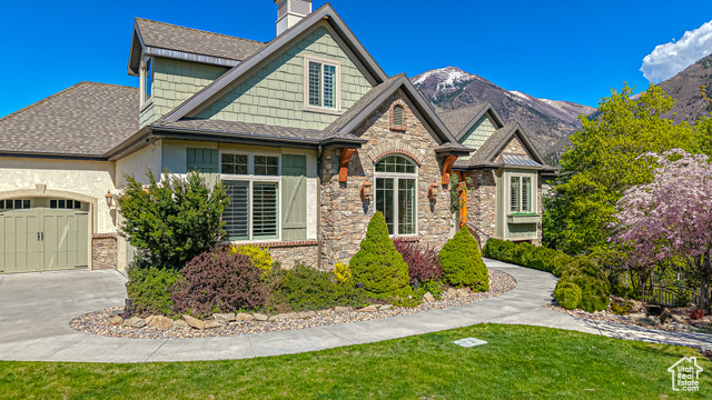 680 S OAK DR Woodland Hills, Utah Be sure to click the tour button for the 3D Virtual Tour! NESTLED at the end of a private winding lane in the scenic foothills of Woodland Hills, this exquisite French country cottage-style home is a rare blend of refined living and natural beauty. Set on 1.52 expansive acres with wooded trails, an orchard and sweeping views of the mountains, valley and Utah Lake, this property offers unmatched privacy, views and tranquility-no backyard neighbors! Step inside to soaring 10 ft ceilings with architectural vaults and gorgeous recently refinished wood floors that flow throughout the main living areas. At the heart of the home is a true chef's kitchen featuring a massive island with prep sink, high-end appliances, wall ovens and an open layout ideal for entertaining. A cozy fireplace surrounded by built-in shelving adds warmth and character to the main living space. The spacious primary suite is a private retreat with a sitting area, spa-like bathroom and direct access to a brand new oversized deck-perfect for enjoying peaceful mornings and shady afternoons. The lower level boasts 9' ceilings, a dedicated theater room, walk-out basement and plenty of room to relax or entertain. Additional highlights include a functional mudroom with built-in lockers, abundant garage storage and ample parking for all your toys and RVs. Whether you're seeking abundant wild life views, adventure or serenity, this property delivers all three-offering space, luxury and the beauty of nature right outside your door. Schedule your tour today!