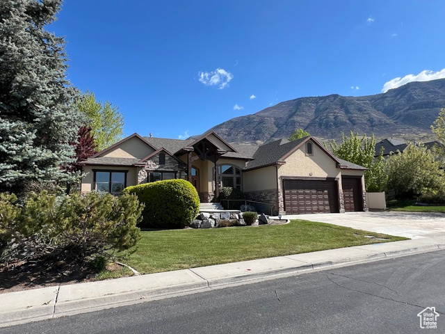 16 W WINDSONG Pleasant Grove, Utah Multiple Offers. Highest & Best Due by Monday the 5th by 11 AM. Amazing East Bench home with Mountain Views. Hard to find over 1/2 Acre Lot. Vaulted Ceilings & Gas Fireplace. 10 ft tall by 9 ft wide 3rd car garage door. 3rd Car garage is deep enough for a boat or RV. Has 220 outlet for Electric Vehicle in garage. Garage also has workbench, storage shelves & sink. New Carpet. Updated Light Fixtures. 200 Ft x 15 ft RV PARKING. Potential for Basement Apartment, it is stubbed for basement kitchenette & second laundry. Has it's own basement entrance. Gas line stubbed in basement family room for future fireplace. The covered basement patio has wiring for Hot Tub.