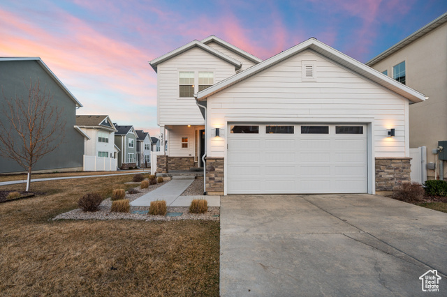 2520 N WISTER LN Lehi, Utah Welcome to this stunning modern home in the heart of Lehi that offers 3,450 square feet of luxury living with 3 bedrooms, 2.5 bathrooms, and an unfinished basement ready for your personal touch. Built in 2018, this home boasts high-end finishes throughout, including gorgeous hardwood floors on the main level and beautiful modern light fixtures. The open-concept layout is perfect for entertaining, featuring a chef's kitchen with a waterfall island that seamlessly connects to the living and dining areas. A dedicated office/flex space provides versatility for work or relaxation. Step outside to a fully fenced and landscaped backyard, where all lawn mowing and weeding are taken care of by the HOA offering low-maintenance outdoor living. Enjoy a prime location near Alpine Schools, Traverse Mountain shopping, and the scenic Jordan River walking trails, creating the perfect balance of convenience and lifestyle. Square footage figures are provided as a courtesy estimate only. Buyer is advised to obtain an independent measurement.