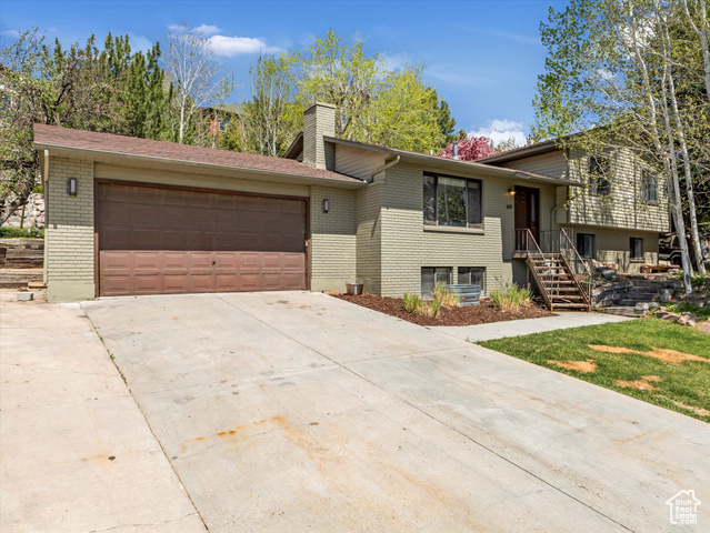 601 E VALLEY DR Heber City, Utah Welcome Home to Rustic Elegance in Valley Hills!! Nestled at the end of a quiet cul-de-sac in the highly desirable Valley Hills neighborhood of Heber, this beautifully updated 5-bedroom, 3-bathroom home offers the perfect blend of modern comfort and rustic character. Set on a generous 0.34-acre lot, the property offers serene mountain views, mature landscaping, and thoughtful design details throughout. Step inside to find warm oak hardwood floors, custom cabinetry, and touches of reclaimed local barn wood that add timeless charm. The heart of the home has a fully updated kitchen, a luxurious primary bath showcase high-quality finishes and smart design. Downstairs, a finished basement opens up to an expansive living and entertaining area, and a garage entrance for added functionality. The outdoor living space is equally impressive, sandstone patios, a fire-pit area, and a spacious backyard offer endless options for relaxing and entertaining. A whimsical playhouse, with water fountain next to it, adds charm and a sense of fun and for little ones or overnight guests. This home is move-in ready with new carpet, and tasteful updates throughout. Located just minutes from downtown Heber and top-rated schools, this rare gem won't last long. Don't miss your chance, priced very well for market, schedule a private showing today and experience everything this Valley Hills retreat has to offer. Square footage figures are provided as a courtesy estimate only and were obtained from county records . Buyer is advised to obtain an independent measurement. Buyer to verify all .