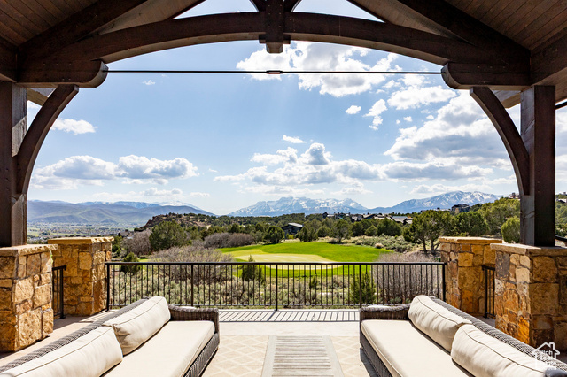 787 N RED LEDGES BLVD Heber City, Utah Set on a unique .74-acre lot in the exclusive Red Ledges community, this stunning home backs to the 10th green of the Jack Nicklaus Signature Golf Course, offering sweeping views of the golf course, Red Ledges' iconic red rock cliffs, and Mount Timpanogos. With 8,297 sq. ft. of thoughtfully designed living space, this home features a theater room, indoor sports court, and high-end finishes throughout. The expansive back deck is perfect for entertaining or relaxing while taking in the breathtaking scenery. Whether you're looking for a luxury full-time residence or mountain retreat, this property delivers privacy, elegance, and direct access to one of Utah's premier golf communities. A Red Ledges Golf Membership is available with deposit.