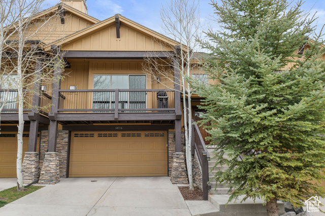 14156 N COUNCIL FIRE TRL Heber City, Utah Mountain Views & Modern Comfort Just 15 Minutes from the Slopes breathtaking views of Deer Valley and Park City Mountain Resort from your private balcony in this beautifully upgraded split-entry townhome in Black Rock Ridge. Perfectly situated just 15 minutes from world-class ski resorts, this 3-bedroom, 3-bathroom residence offers elevated mountain living with direct access to scenic hiking trails that connect to Deer Vista. Inside, you'll find an inviting open-concept living space with hardwood floors, a stone-surround gas fireplace, and a well-appointed kitchen featuring granite countertops, a center island, and high-end JennAir appliances. The spacious primary suite opens to a private patio and includes a luxurious en-suite with a walk-in tile shower, soaking tub, and a large walk-in closet. Downstairs features a bonus room, guest suite, and additional storage. The oversized garage includes a bump-out for a workshop and an EV charger. The HOA covers visitor parking, internet, phone and landscaping. Owners may opt into a Black Rock Ridge Hotel membership for access to the pool, gym, and other resort-style amenities. A sunshade-covered balcony, improved driveway for low-clearance vehicles, and flexible 7-day minimum rentals complete the package-making this the perfect primary residence, vacation home, or investment property.