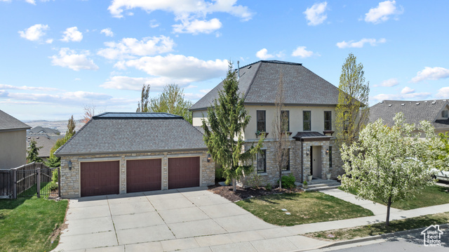 5047 N LARKWOOD LN Lehi, Utah Stunning two-story home located in a highly sought-after Lehi neighborhood! This beautifully maintained property features a modern kitchen with sleek white cabinetry, granite countertops, a tabletop gas stove, a walk-in pantry, and abundant storage. The open-concept floor plan flows seamlessly into a bright and airy living area with a cozy fireplace and large windows that fill the space with natural light. Step out onto the expansive deck and enjoy breathtaking mountain views.The spacious primary suite includes a large walk-in closet with built-in shelving and a luxurious ensuite bathroom featuring dual sinks, a soaking tub, and a separate shower. Upstairs, each bedroom boasts its own private bathroom and walk-in closet, offering comfort and privacy for everyone.The fully finished walkout basement includes a kitchenette, living area, two additional bedrooms, and a full bathroom-ideal for guests or a potential mother-in-law apartment. The beautifully landscaped backyard is a private oasis, complete with mature trees and a covered patio, perfect for relaxing or entertaining. Conveniently located near shopping, dining, and with easy access to the freeway, this home truly has it all! Measurements provided as a courtesy only, buyer to verify all info.