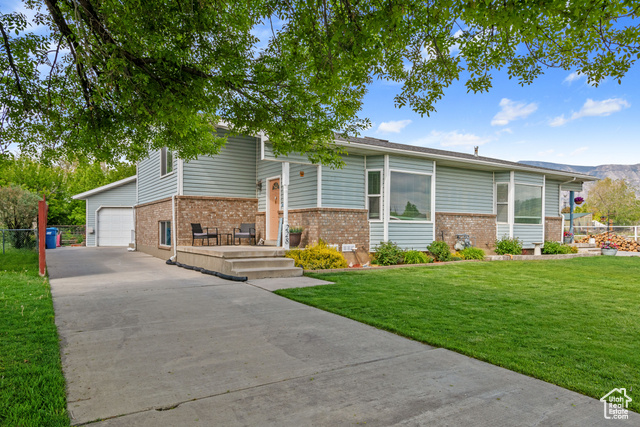 228 W 470 S American Fork, Utah Don't miss this beautifully maintained twin home nestled on a quiet dead-end street. This home offers an oversized two-car garage, two spacious family rooms, vaulted ceilings, generous storage space, a bright walkout basement, and a charming garden space with raspberries, strawberries, and blackberries. You'll love the abundance of natural light streaming through south-facing windows and a skylight, creating a warm and inviting atmosphere throughout. Recent updates include new vinyl windows, durable vinyl flooring, modern kitchen cabinets, and elegant quartz countertops. Ideally located with quick access to I-15 and American Fork Main Street, and just minutes from the American Fork Trax Station, Costco, Target, Home Depot, and a wide variety of dining and shopping options. Experience the best of both worlds: peaceful living in a secluded community with all the conveniences you need just moments away. Schedule your showing today!