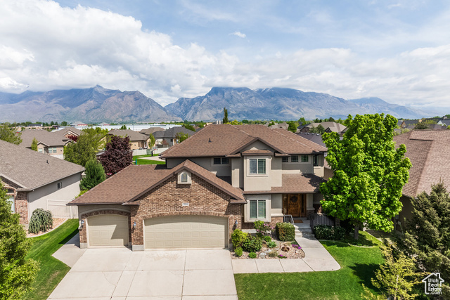 3266 N 1300 E Lehi, Utah Move-in ready with new carpet, fresh paint, updated lighting fixtures, and a new water heater. Enjoy breathtaking mountain views and direct access to the HOA park featuring a playground, gazebo, BBQ grills, and a combo basketball/pickleball court. Prime location near Timpanogos Highway, shopping, and the Murdock Canal Trail. Walking distance to Renaissance Academy charter school (language immersion program), grocery store, and brand-new VASA Fitness with pool, gym, and sports courts. Professionally landscaped yard includes mature trees, raised garden beds with drip irrigation, and fruit-bearing plants: blackberries, raspberries, grapevines, and an apricot tree. Hurry, you can be in by summer and start enjoying all this community has to offer!