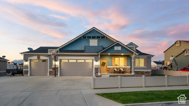 143 E SALEM PARK CIR Salem, Utah Experience Waterfront Luxury in One of Salem's Most Coveted Neighborhoods, Salem Park! This stunning waterfront property offers an exceptional blend of elegance, comfort, and natural beauty. Nestled in a tranquil, beautifully landscaped setting, the home captures breathtaking sunsets and serene mountain and water views from two expansive decks-perfect for relaxing or entertaining. Inside, the gourmet kitchen is a chef's dream, featuring granite countertops, a double oven, and generous space for both daily living and hosting guests. The expansive primary suite serves as a private retreat, complete with dual oversized walk-in closets. The fully finished walk-out basement includes a private entrance and a complete apartment setup-ideal for guests, multi-generational living, or rental income. Additional premium features include RV parking and permanent exterior holiday lighting. This is more than a home-it's a lifestyle. Schedule your private tour today!