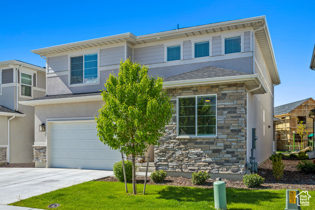 1531 W 300 N Pleasant Grove, Utah Experience comfort and style in this stunning Richmond American home, located in the desirable Hidden Springs subdivision. The spacious Moonstone floor plan offers an open-concept design perfect for everyday living and entertaining. The kitchen features quartz countertops, a large center island, stainless steel appliances, and an electric cooktop. A semi-formal dining area opens to a covered back patio through sliding glass doors, while the great room showcases a cozy gas fireplace and elegant tile flooring. Upstairs offers a versatile loft/family room, a luxurious primary suite with a custom walk-in shower, dual vanities, and a spacious walk-in closet. Three additional bedrooms and convenient upstairs laundry complete the upper level. With modern finishes, ample storage, and a smart layout, this home is ready to turn the key and move right in!!!!