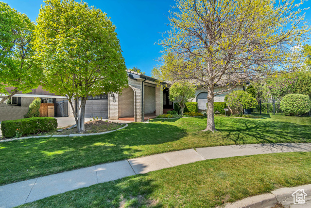 2587 E OAK CREEK CIR Sandy, Utah Welcome to 2875 E Oak Creek Circle, a beautifully situated home in one of Sandy's most desirable east bench neighborhoods. This Mediterranean style architecture offers a perfect blend of comfort, charm, and convenience, nestled on a quiet cul-de-sac with stunning mountain views. Step into the home with spacious living areas and abundant natural light that creates a warm and inviting atmosphere. The heart of the home features an updated kitchen with modern finishes, perfect for cooking, entertaining, and everyday living. It flows seamlessly into a cozy family room with a fireplace. One of the true highlights of this property is the running stream that flows through the backyard, creating a tranquil and private outdoor setting. Adding to the home's versatility is a private mother-in-law apartment, ideal for multigenerational living or as a rental opportunity for supplemental income. You'll love the proximity to top-rated schools, parks, shopping, and hiking trails, as well as quick access to both Little and Big Cottonwood Canyons. Don't miss your chance to own a home in this sought-after neighborhood. Schedule your private showing today!