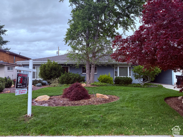 8478 S 1475 E Sandy, Utah This lovely home has a spacious layout ideal for family gatherings & entertaining inside & out! 4 XL bedrooms, 2 baths, & lots of storage! The updated kitchen has granite countertops, wood-burning stove, gas range, & stylish cabinets! Enjoy stunning mtn views & a beautiful yard designed by a master gardener! Fenced w/ auto sprinklers, gazebo, & covered patio. 68 years of a richly worked garden by original owners. Conveniently located in a friendly neighborhood near schools, parks, shopping, & dining. Must See! Sqft figures are a courtesy estimate only and were obtained from tax data. Buyer is advised to obtain an independent measurement.