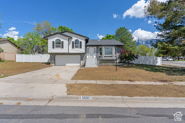 10287 S LOCKSLEY RD Sandy, Utah Stylish, move-in ready home with modern updates throughout. Features a new HVAC system, top-of-the-line whole-house humidifier, new radon mitigation, and a recently updated water heater. The basement includes a brand new bathroom with a marble countertop and sleek floating cabinet. The kitchen is completely new, featuring waterproof cabinetry, quartz countertops, new stove, and new sink. Renovated bathrooms shine with granite counters, glass tile, cast iron tubs, double sinks, and new cabinetry. Additional highlights include brand new flooring, fresh paint, vaulted ceilings, a newly updated fireplace, and a brand new fence. All recent work is fully up to code-just move in and enjoy! Please stay off the lawn area as it is being hydroseeded. 3D Video Tour: https://listings.saltlakerealestatephotography.com/videos/0196b561-0e75-725b-8b26-997c03a79315; 3D Interactive Tour: https://my.matterport.com/show/?m=7E9MS2f33uK&brand=0&mls=1&