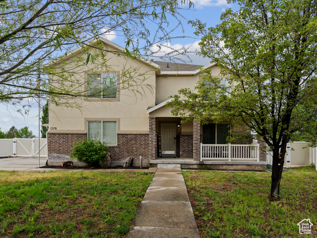 1370 S 1500 W Springville, Utah Open House: Saturday, May 17th, 12 PM - 2 PM. Don't miss this beautifully updated home featuring an open floor plan ideal for modern living and entertaining! The spacious living and dining areas flow together seamlessly with the outdoor fully covered patio. This 5 bedroom home has walk in closets in all bedrooms and the inviting owner bedroom suite boasts an extended walk-in closet and en-suite bathroom. Step outside to your private patio and a fantastic .86-acre fully fenced yard with a large dog run. Perfect for a large garage/shop to be built. This unique property also offers a bedroom on the main floor that you could turn into a junior suite providing excellent flexibility for multi-generational living. two family rooms, and 3 car garage with RV parking. Located close to shops and amenities, convenience is key. This move-in ready home is a must-see!